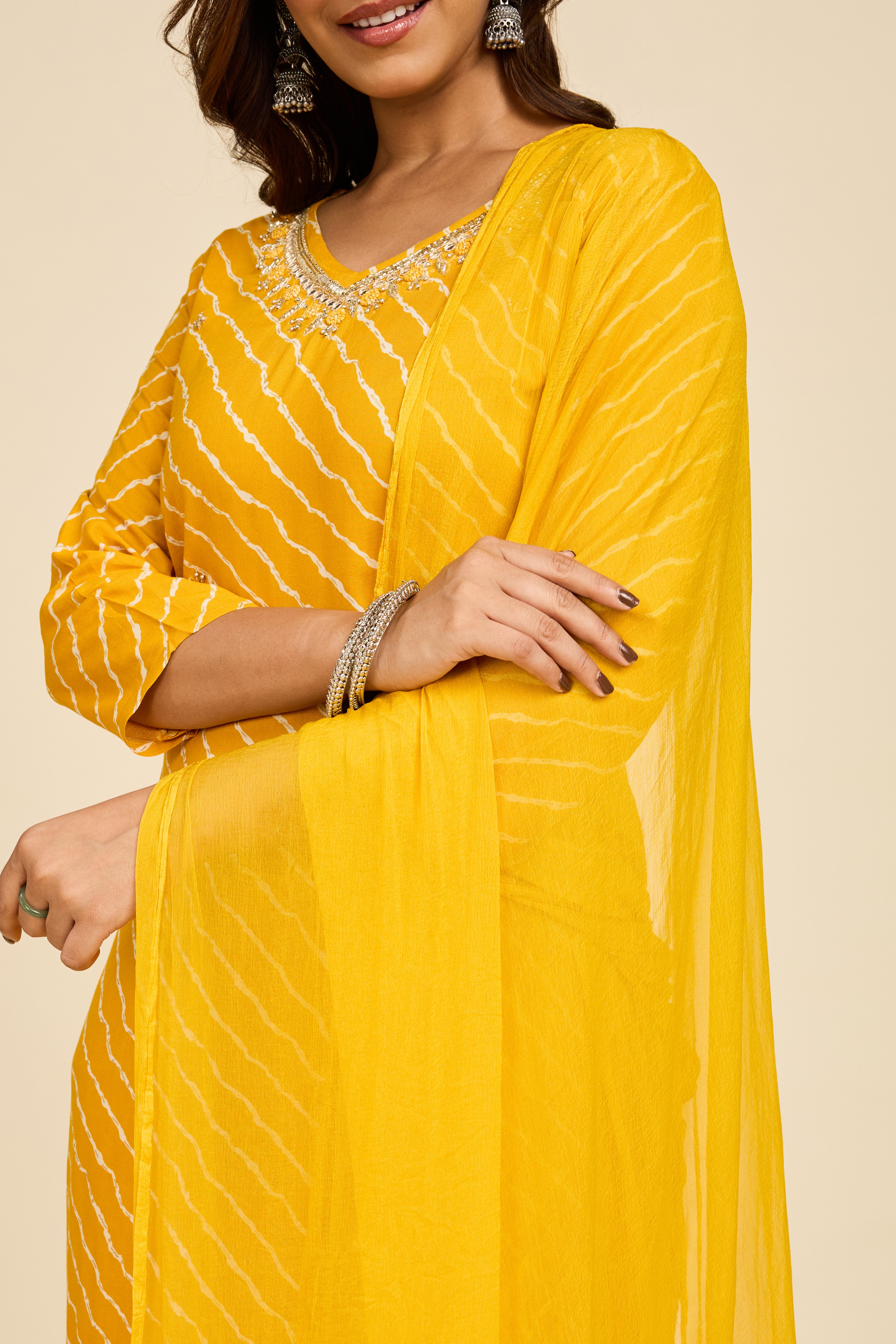 Alaya Select Haldi Leheriya Kurta Set